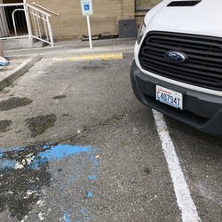 Overlake Square Mall - The van blocked two disabled parking spots while working on remodeling the restaurant