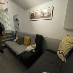Here is one of the waiting areas and a photo collage of the pup this place is named after Here is one of the waiting areas and a photo collage of the pup this place is named after