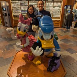Daisy and Donald Duck statues at Disney's Pin Traders at Disney Springs. Pin Trading, Disney Parks.