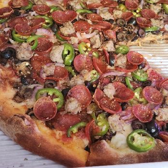 Hella Pie Pizza - A large used to be 18" w/8 slices. Now their large is 16" w/6 slices :( - Pizza Near Me - Tracy, California Hella Pie Pizza - A large used to be 18" w/8 slices. Now their large is 16" w/6 slices :( - Pizza Near Me - Tracy, California