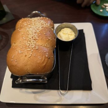 Arrowhead Grill - Warm loaf of bread with creamy butter - Seafood Near Me - Glendale, Arizona