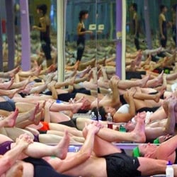 Namaste Hot Yoga and Wellness - Hand to knee pose
