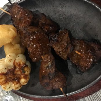 Aromas del Peru - Anticuchos (calf heart) - Peruvian Near Me - Miami, Florida Aromas del Peru - Anticuchos (calf heart) - Peruvian Near Me - Miami, Florida