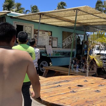 Da Bald Guy - The line at 11:30am for lunch. You don't have to wait long cause they work hard to get the food out to you as quick as possible. - Food Trucks Near Me - Kahuku, Hawaii Da Bald Guy - The line at 11:30am for lunch. You don't have to wait long cause they work hard to get the food out to you as quick as possible. - Food Trucks Near Me - Kahuku, Hawaii
