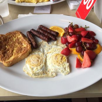 Flips Restaurant - Flips breakfast - two eggs, choice of meat, one side, and toast. Replaced toast for French toast for a surcharge of $3.50. - Breakfast & Brunch Near Me - Brampton, Ontario Flips Restaurant - Flips breakfast - two eggs, choice of meat, one side, and toast. Replaced toast for French toast for a surcharge of $3.50. - Breakfast & Brunch Near Me - Brampton, Ontario