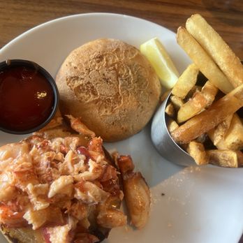Stonebridge Restaurant - 4 ounce lobster roll. The french fries are really good nice and crispy. - Seafood Near Me - Milford, Connecticut