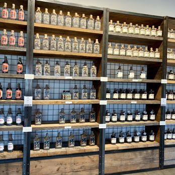 High Wire Distilling - shelves of liquor bottles - Beer, Wine & Spirits Near Me - Charleston, South Carolina