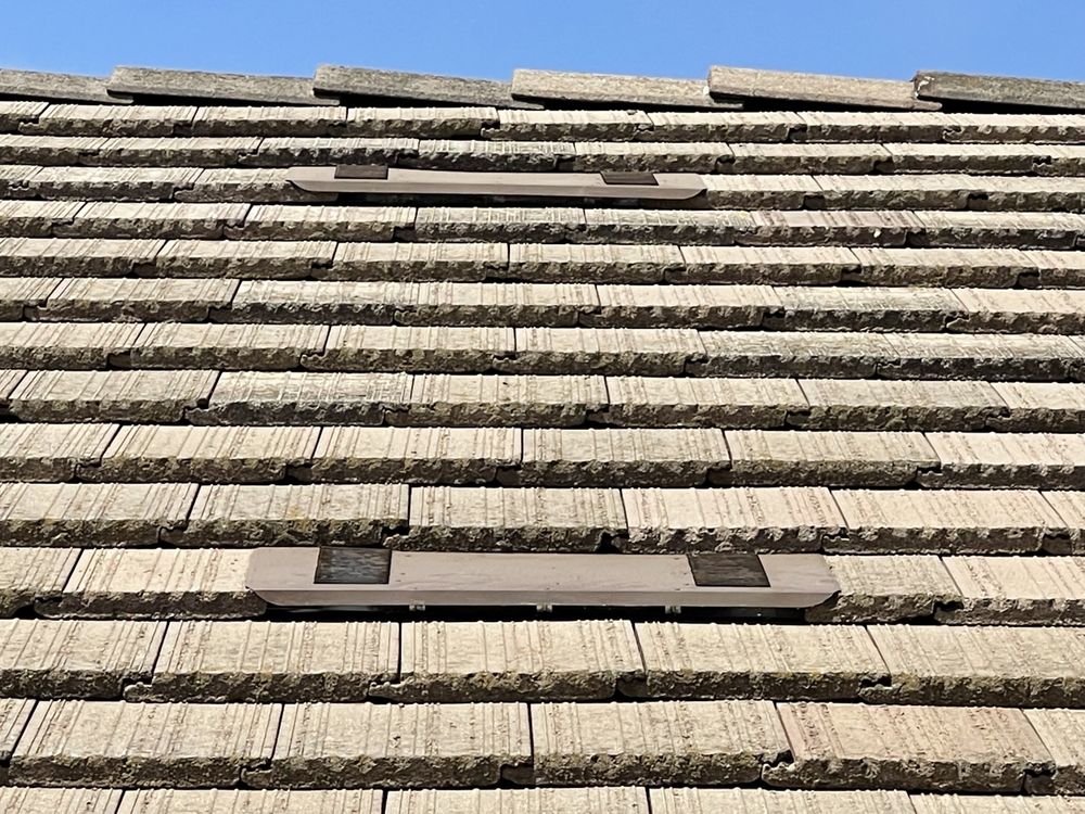 Slide of All American Roofing