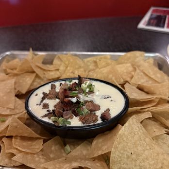 Lucille's Smokehouse Bar-B-Que - SMOKED BRISKET QUESO DIP - Barbeque Near Me - Henderson, Nevada Lucille's Smokehouse Bar-B-Que - SMOKED BRISKET QUESO DIP - Barbeque Near Me - Henderson, Nevada