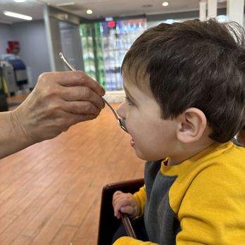Persis Indian Grill - a little boy getting his hair cut - Indian Near Me - Jacksonville, Florida Persis Indian Grill - a little boy getting his hair cut - Indian Near Me - Jacksonville, Florida