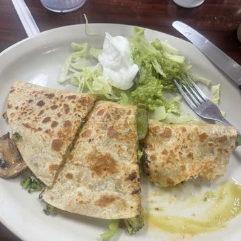 El Rancho - Vegie quesadillas with guacamole and a green salsa. - Mexican Near Me - Burnet, Texas El Rancho - Vegie quesadillas with guacamole and a green salsa. - Mexican Near Me - Burnet, Texas