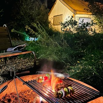AutoCamp Russian River - Fireplace in front of tent - Hotels Near Me - Guerneville, California
