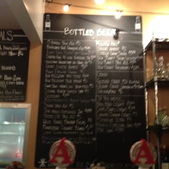 Lowry Beer Garden - Long list of bottled beer (sorry, blurry) - Burgers Near Me - Denver, Colorado