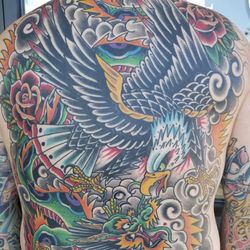 Ink City Tattoo - Large scale American Traditional back piece by Jason. The owner and founder of Ink City Tattoo Studio.