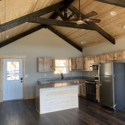 Smoky Mountain Lake Adventures - Granite countertops and hickory cabinets await you int this lakefront cabin available to rent on the beautiful Douglas Lake.