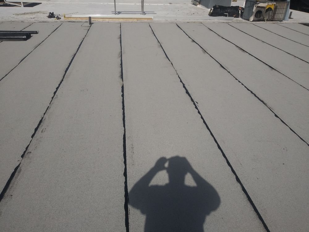 Slide of Saranovic & sons roofing