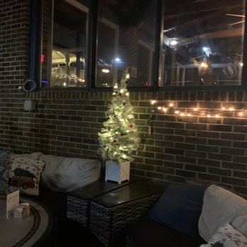 Madigan's Waterfront - a living room decorated for christmas - Seafood Near Me - Occoquan, Virginia