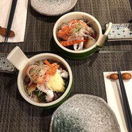 Seaweed salad with tako surf clam, kani, shrimpsprouts,cucumber and apple! Seaweed salad with tako surf clam, kani, shrimpsprouts,cucumber and apple!