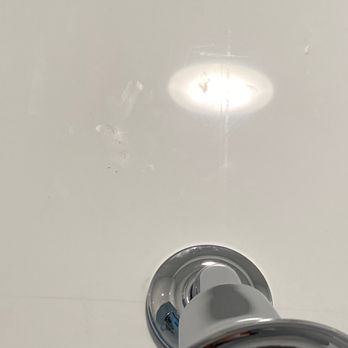 Mad City Windows & Baths of Minneapolis - Scratches on every side of the shower.  Per THEIR contract, this voids the warranty.  Shower has never been used at this point - Windows Installation Near Me - Roseville, Minnesota