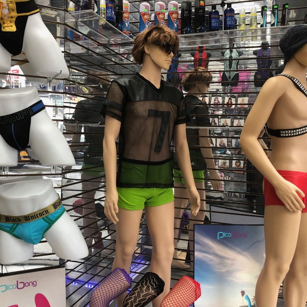 The neon glow of forbidden entertainment