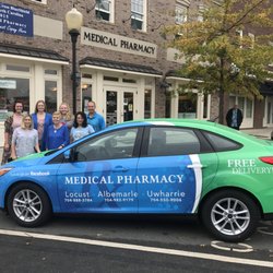 Medical Pharmacy of Locust - Our wonderful staff and delivery car in front of our store located in Locust town center!!
