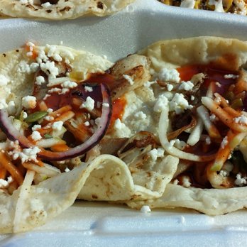 Tarascó - A couple pork belly tacos out of a 3-taco order. - Mexican Near Me - Albuquerque, New Mexico