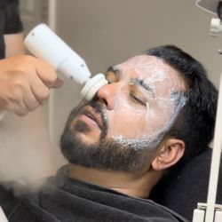 Facial treatment at Milton salon & barbershop