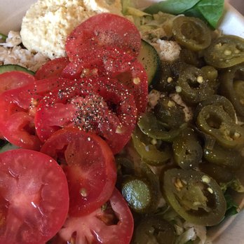 Which Wich - There is a little Pesto Chicken underneath all those tomatoes and jalapeños. - Sandwiches Near Me - San Diego, California Which Wich - There is a little Pesto Chicken underneath all those tomatoes and jalapeños. - Sandwiches Near Me - San Diego, California