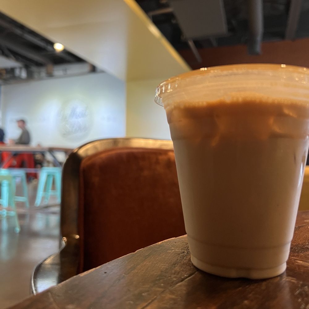 Mokah Coffee & Tea - a coffee cup on a table - Coffee & Tea Near Me - Dallas, Texas Mokah Coffee & Tea - a coffee cup on a table - Coffee & Tea Near Me - Dallas, Texas