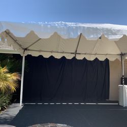 Party Pro Rental Center - Perfect area for the band . I added a backdrop from Amazon and outdoor carpet from Costco to make a stage . The canopy was super great