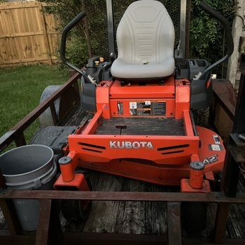 The Lawn Whisperer - the front of the tractor - Lawn Services Near Me The Lawn Whisperer - the front of the tractor - Lawn Services Near Me