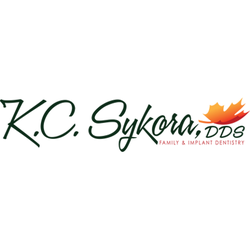 K C Sykora, DDS