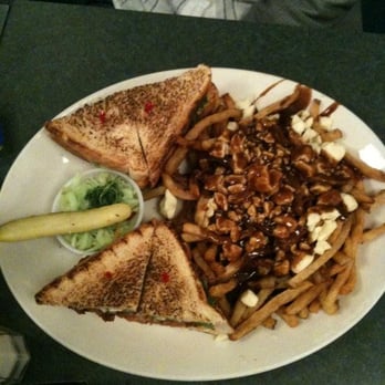 Elgin Street Diner - The cure for a hangover, club sandwich with poutine. - Diners Near Me - Ottawa, Ontario Elgin Street Diner - The cure for a hangover, club sandwich with poutine. - Diners Near Me - Ottawa, Ontario