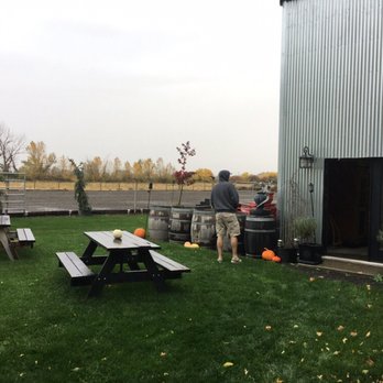 Dragon's Gate Brewery - Patio leading into the brewery with a dressage arena in the background. - Breweries Near Me - Milton-Freewater, Oregon