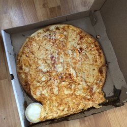 Artigiano Pizza - This is a picture of the pizza they sent us twice today. Claims they are sending the $23.00 refund but have received it back yet.