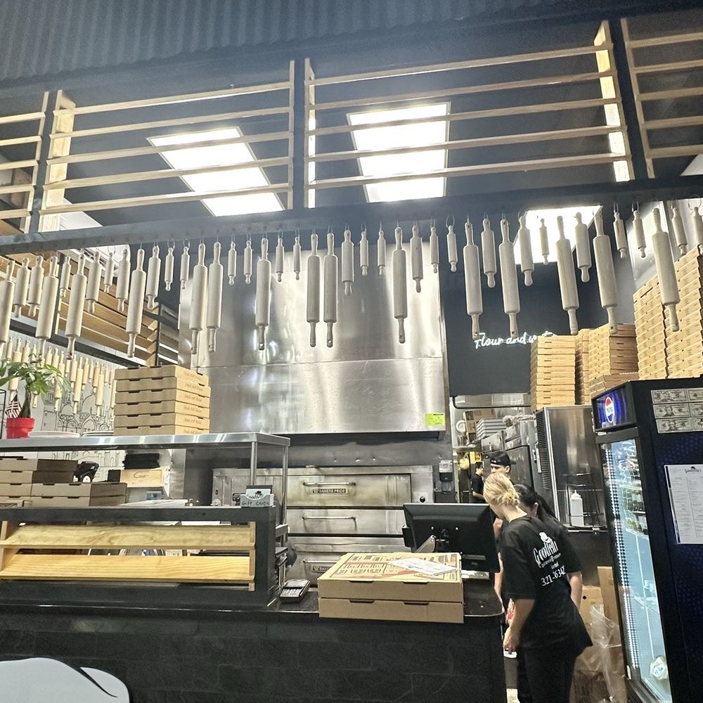 Goodfellas Pizzeria - Inside counter, super cool decor with hanging rolling pins. - Pizza Near Me - Sanford, Florida Goodfellas Pizzeria - Inside counter, super cool decor with hanging rolling pins. - Pizza Near Me - Sanford, Florida