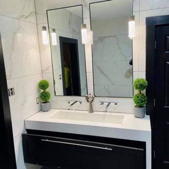 Houzz Boss - a bathroom with a double sink - General Contractors Near Me