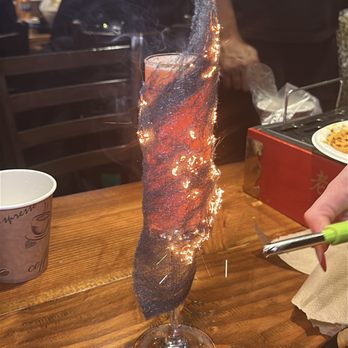 Gao's BBQ & Crab - Could have done without the fire because this cocktail tasted amazing without the theatrics - Chinese Near Me - Flushing, New York