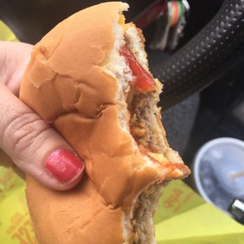 McDonald's - a person holding a sandwich in their hand - Fast Food Near Me - Southampton, Pennsylvania McDonald's - a person holding a sandwich in their hand - Fast Food Near Me - Southampton, Pennsylvania