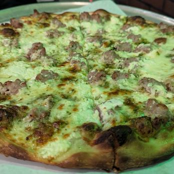 Mona Lisa Ristorante - Pesto pizza with sausage and feta - Italian Near Me - Thomaston, Connecticut Mona Lisa Ristorante - Pesto pizza with sausage and feta - Italian Near Me - Thomaston, Connecticut