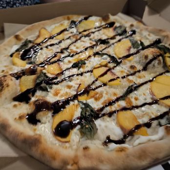 Ponysaurus Brewing Co - Peach pizza - Breweries Near Me - Durham, North Carolina