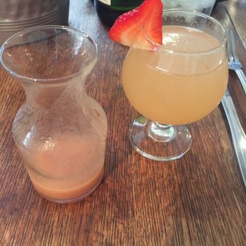 The Root Cellar Cafe - Peach mimosa ...make your own - Breakfast & Brunch Near Me - San Marcos, Texas