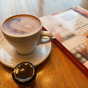 Cat Island Coffeehouse - Cappuccino with a southern cooking book. Awww. - Coffee & Tea Near Me - Pass Christian, Mississippi Cat Island Coffeehouse - Cappuccino with a southern cooking book. Awww. - Coffee & Tea Near Me - Pass Christian, Mississippi