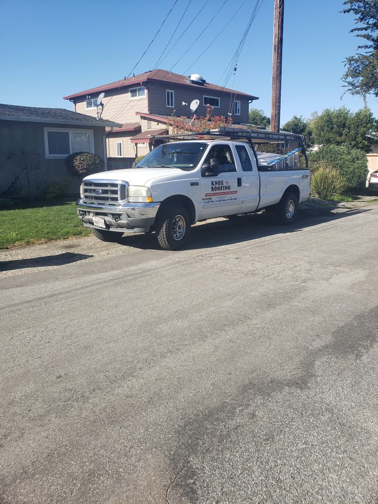 Slide of Knox Roofing