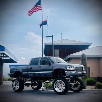 Rent-A-Dad - ows a truck parked in front of a gas station - Landscaping Near Me Rent-A-Dad - ows a truck parked in front of a gas station - Landscaping Near Me