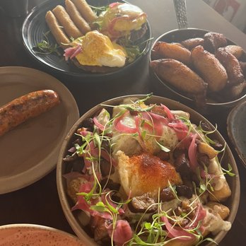 Selva - side of chorizo, selva benedict, yuccas chorreadas, and sweet plantains - Bars Near Me - Long Beach, California