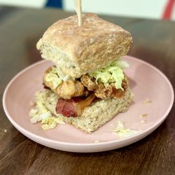 Preservation Biscuit Company - The PBC  Chicken strips, hot honey, bacon, napa cabbage, smoked gouda pimento cheese, dijon mustard