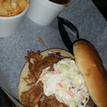 Uncle Kenny's BBQ - Carolina pulled pork sandwich with macaroni and cheese and baked beans - Barbeque Near Me - Clermont, Florida Uncle Kenny's BBQ - Carolina pulled pork sandwich with macaroni and cheese and baked beans - Barbeque Near Me - Clermont, Florida
