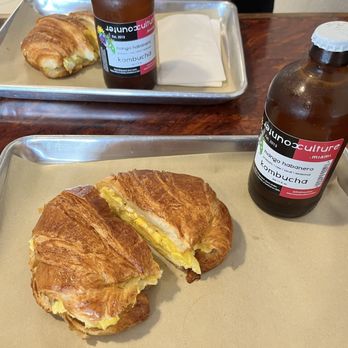 Bettant Bakery & Café - Egg croissant with locally brewed kombucha - Coffee & Tea Near Me - Miami Beach, Florida Bettant Bakery & Café - Egg croissant with locally brewed kombucha - Coffee & Tea Near Me - Miami Beach, Florida