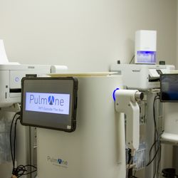 The Respire Institute - Pulmonary and Sleep Medicine - Pulmonary function testing room with two PulmOne machines for precise lung assessments and accurate breathing measurements.